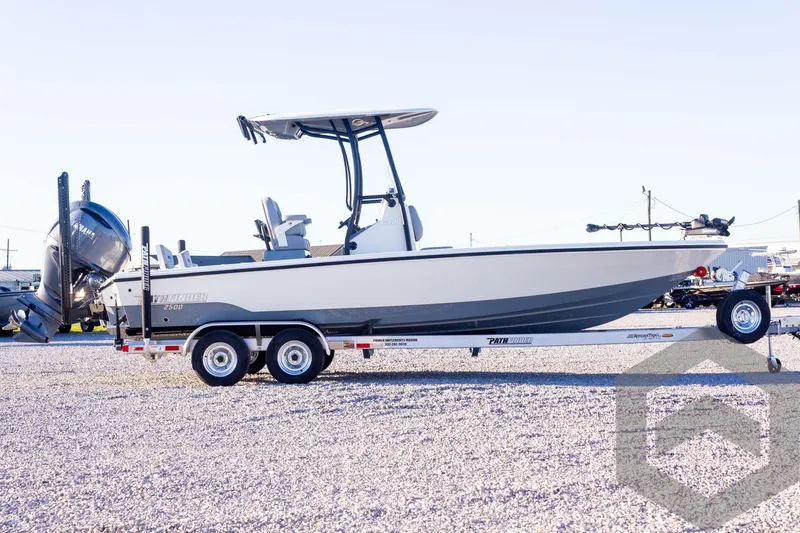 Slide: The Image of 2025 Pathfinder 2500 Hybrid boat on trailer, side view, outdoors. - 8