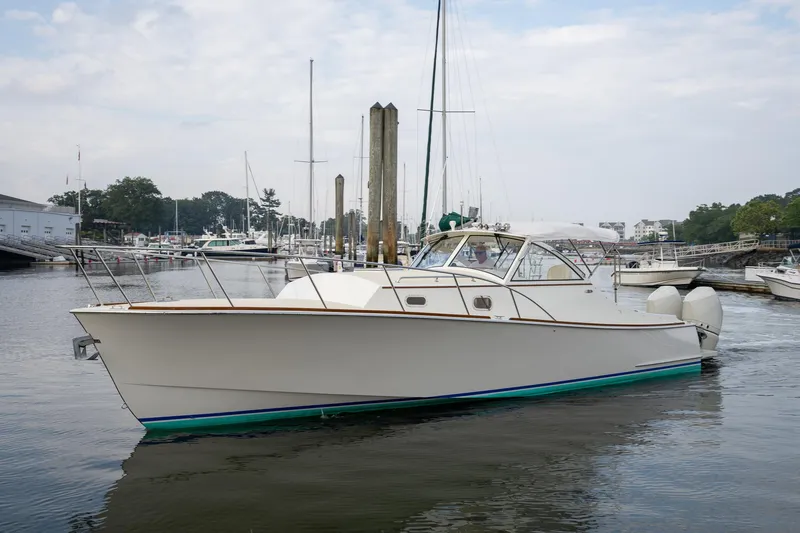 Slide: The Image of 2021 Brooklin Boat Yard 32 Express in marina, side view. - 1