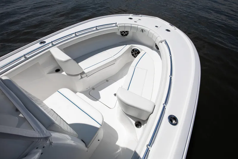 Slide: The Image of 2025 Buddy Davis 28 Center Console boat interior with white seating and sleek design. - 36