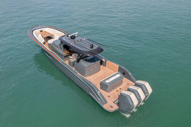 The Image of 2025 Buddy Davis PININFARINA 47 CC luxury boat on calm water. - 1