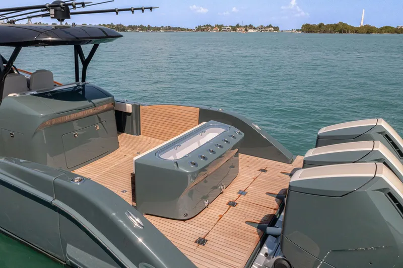 Slide: The Image of Luxury 2025 Buddy Davis PININFARINA 47 CC boat with sleek design and powerful engines on water. - 10