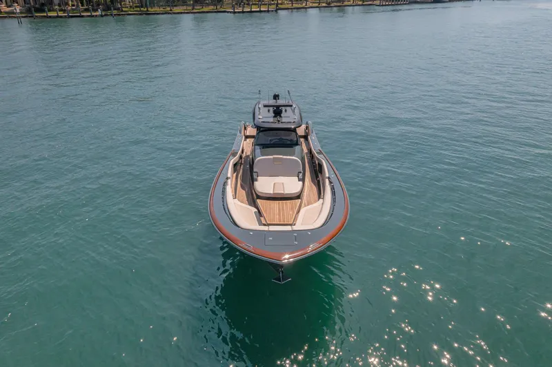 Slide: The Image of 2025 Buddy Davis PININFARINA 47 CC yacht on calm water, aerial view. - 16