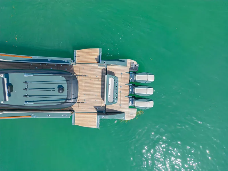 Slide: The Image of Aerial view of 2025 Buddy Davis PININFARINA 47 CC yacht on turquoise water. - 24