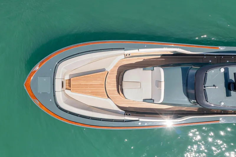 Slide: The Image of Aerial view of 2025 Buddy Davis PININFARINA 47 CC yacht on turquoise water. - 3