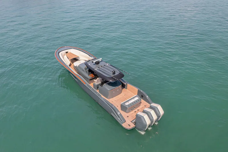 Slide: The Image of 2025 Buddy Davis PININFARINA 47 CC boat on calm water, aerial view. - 8