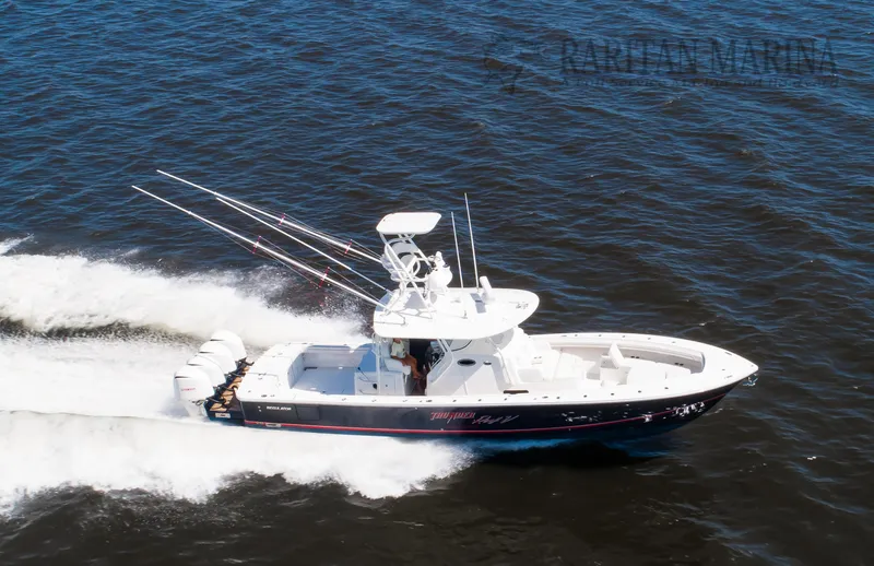 Slide: The Image of 2016 Regulator 41 boat cruising on open water, aerial view. - 19