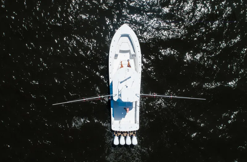 Slide: The Image of Aerial view of 2016 Regulator 41 boat on dark water. - 33