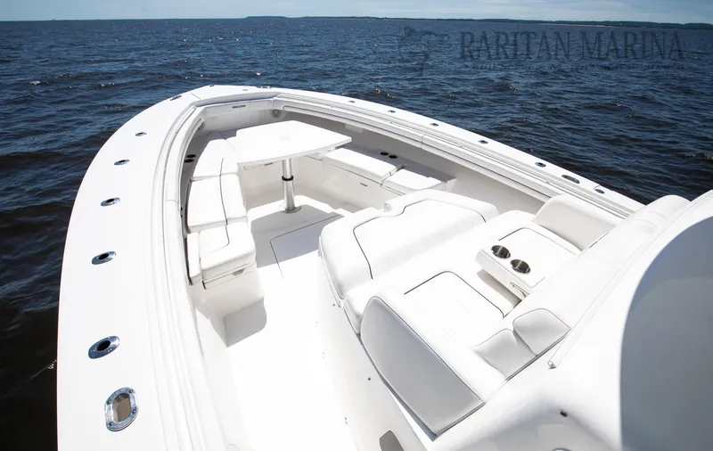 Slide: The Image of 2016 Regulator 41 boat with spacious seating on open water. - 41