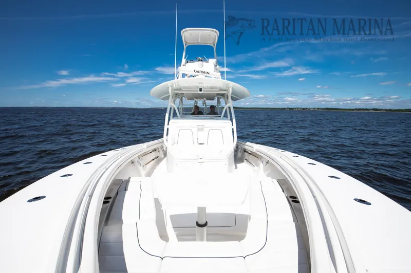 Slide: The Image of 2016 Regulator 41 boat on open water, clear sky, Raritan Marina. - 43