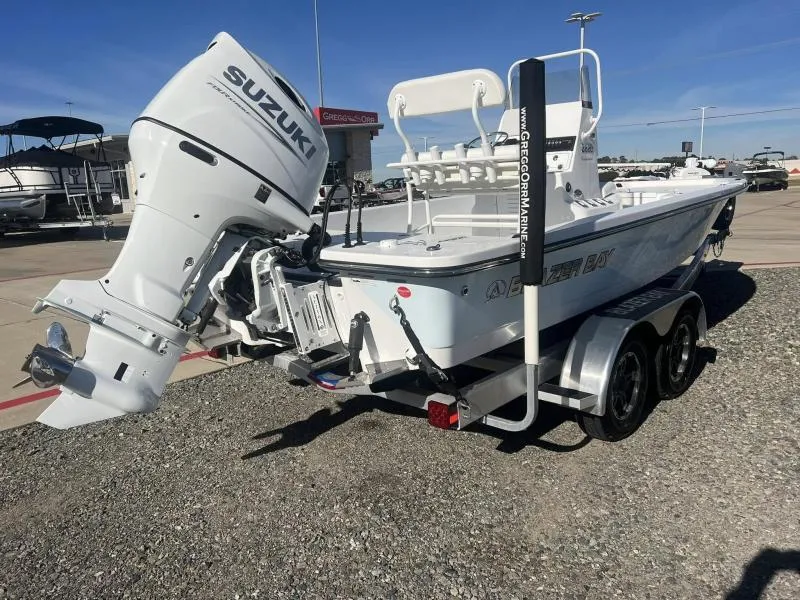 Slide: The Image of 2023 Blazer 2220 Fisherman boat with Suzuki outboard motor on trailer. - 3