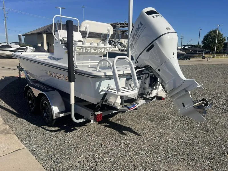 Slide: The Image of 2023 Blazer 2220 Fisherman boat with Suzuki outboard motor on trailer. - 5