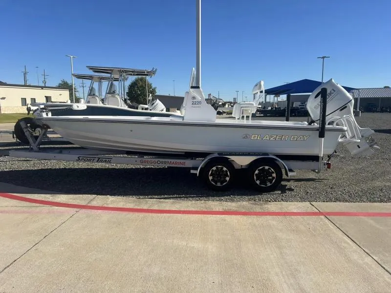 Slide: The Image of 2023 Blazer 2220 Fisherman boat on trailer in outdoor setting. - 6