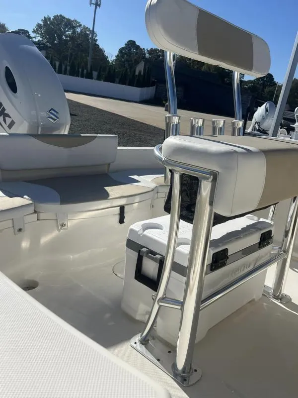 Slide: The Image of 2024 Bulls Bay 200CC boat interior with seating and storage. - 11