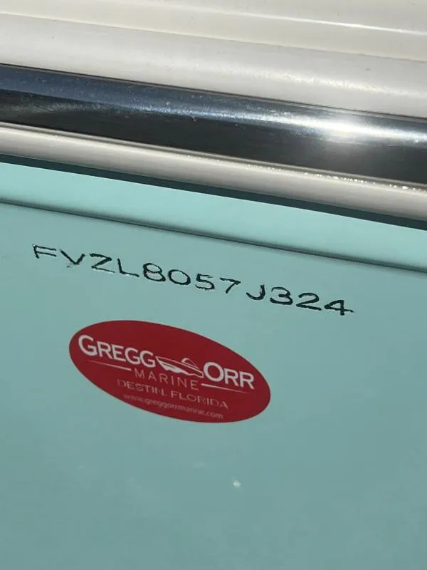 Slide: The Image of 2024 Bulls Bay 200CC boat with Gregg Orr Marine sticker and serial number. - 18