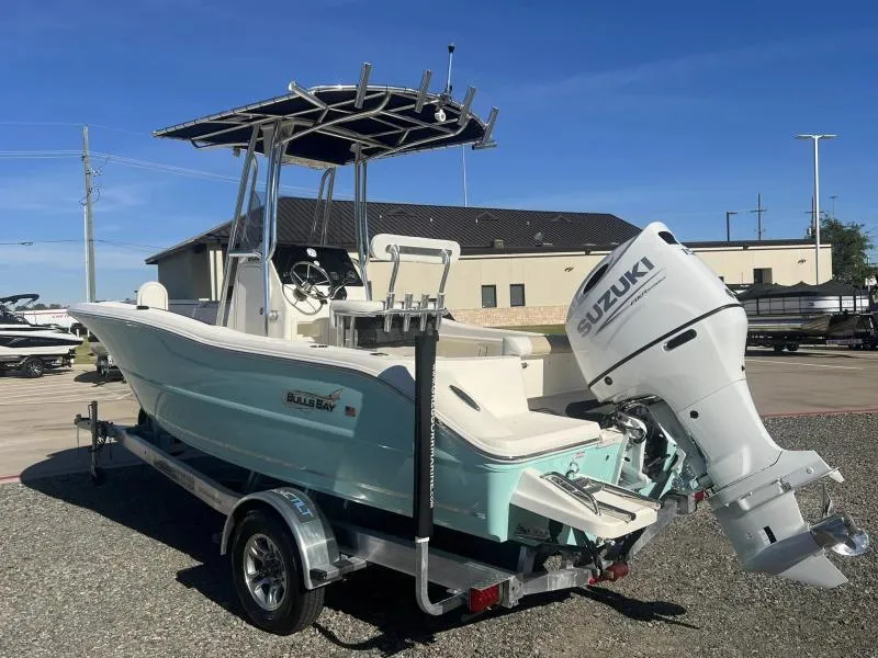 Slide: The Image of 2024 Bulls Bay 200CC boat with Suzuki outboard motor on trailer. - 3