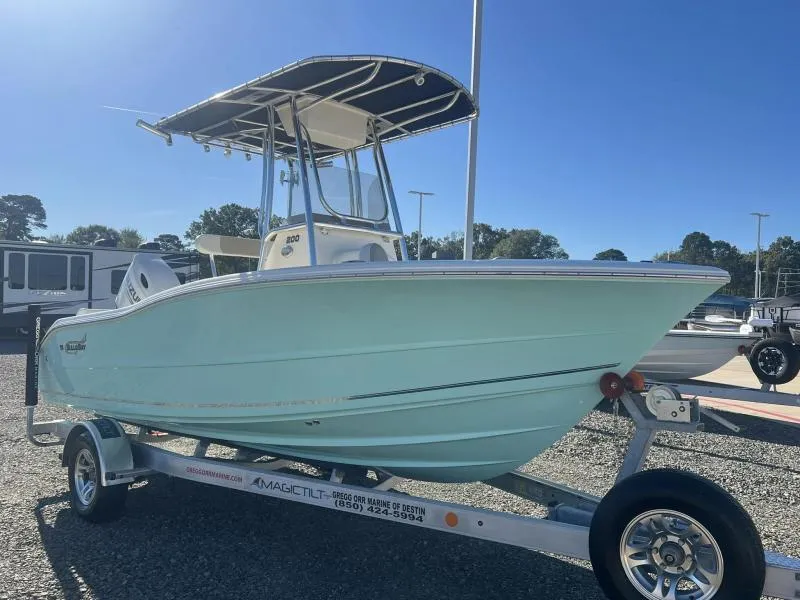 Slide: The Image of 2024 Bulls Bay 200CC boat on trailer under clear blue sky. - 7