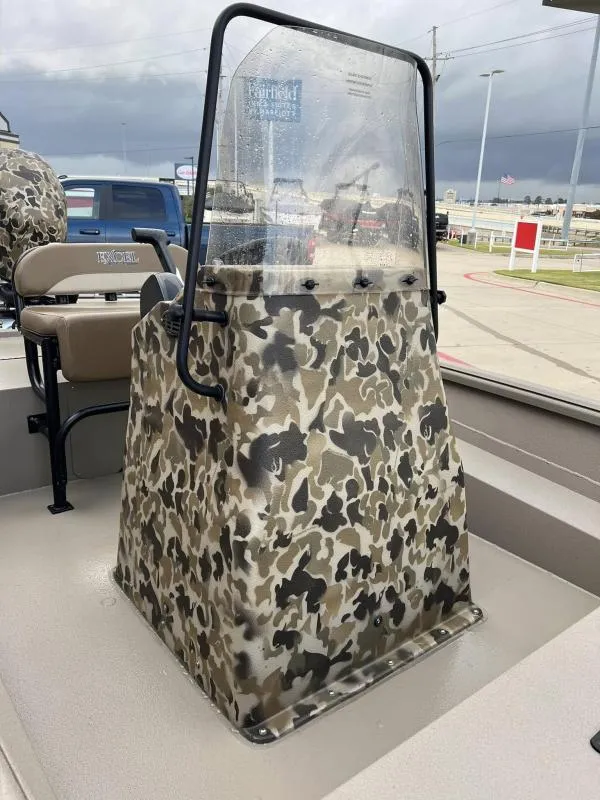 Slide: The Image of 2024 Excel Boats 1860 STALKER with camouflage console and windshield. - 11