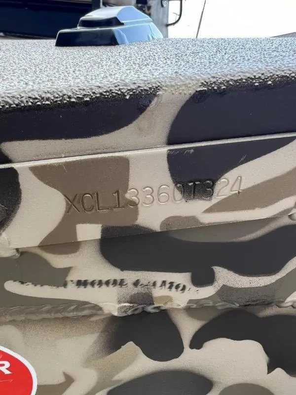 Slide: The Image of 2024 Excel Boats 1860 STALKER with camouflage pattern and serial number XCL13360T324. - 17