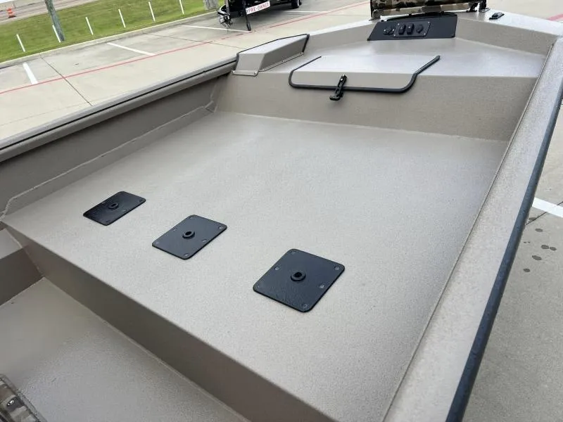 Slide: The Image of 2024 Excel Boats 1860 STALKER interior view, showcasing spacious deck and storage compartments. - 8