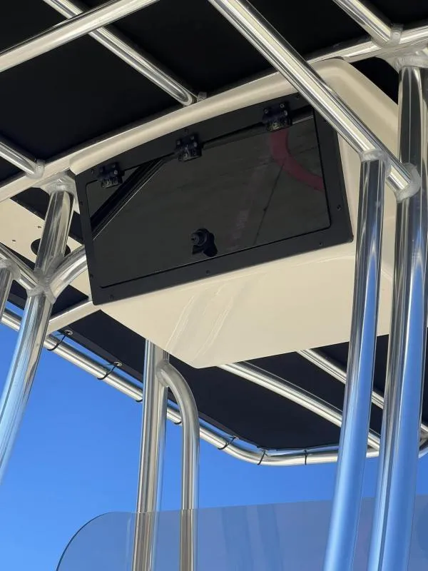 Slide: The Image of 2024 Bulls Bay 200 CC boat T-top with storage compartment, stainless steel frame. - 10