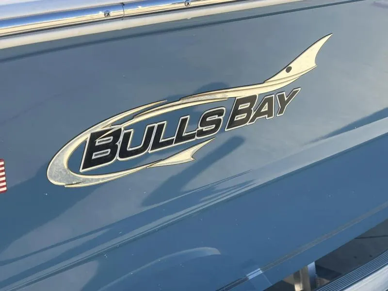 Slide: The Image of 2024 Bulls Bay 200 CC boat logo on blue hull. - 20