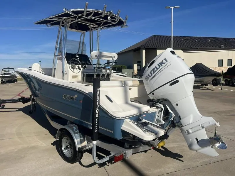 Slide: The Image of 2024 Bulls Bay 200 CC boat with Suzuki outboard motor on trailer. - 3