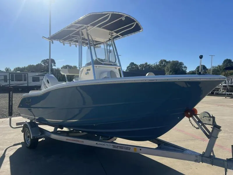 Slide: The Image of 2024 Bulls Bay 200 CC boat on trailer, parked outdoors under clear sky. - 7