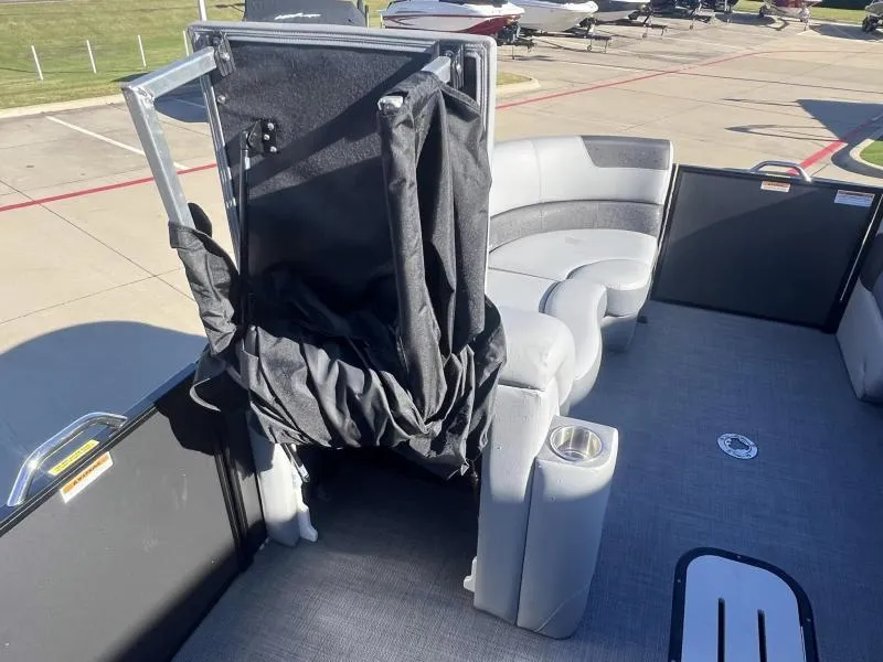 Slide: The Image of 2024 Veranda VR22RC pontoon boat interior with seating and storage area. - 11