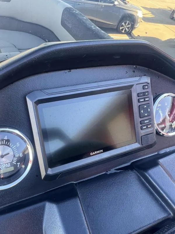 Slide: The Image of 2024 Veranda VR22RC dashboard with Garmin display and gauges. - 21