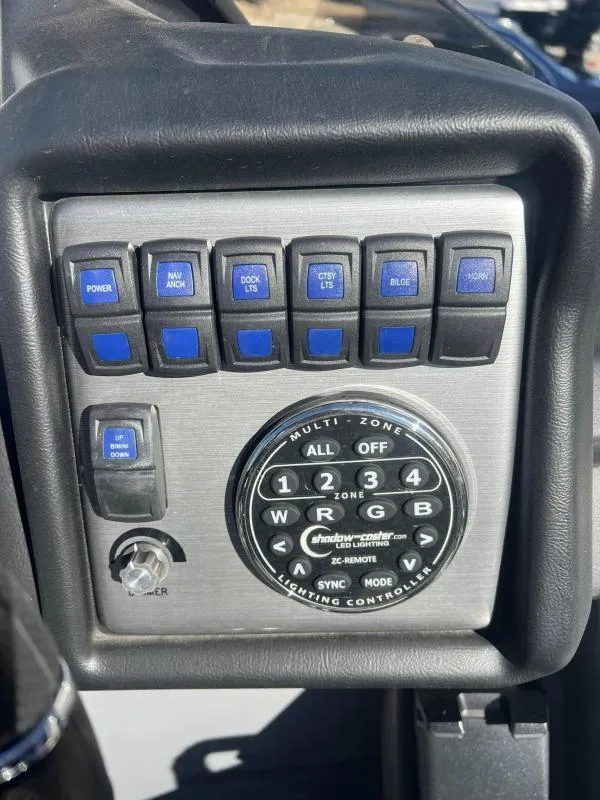 Slide: The Image of Control panel of 2024 Veranda VP25RC boat with lighting and switch controls. - 20