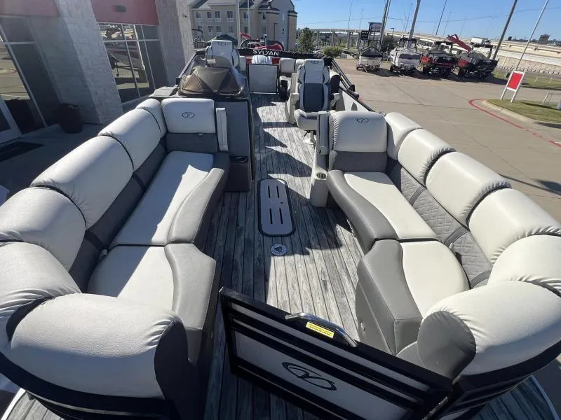 Slide: The Image of 2024 Veranda VP25RC pontoon boat with spacious seating and modern design. - 7