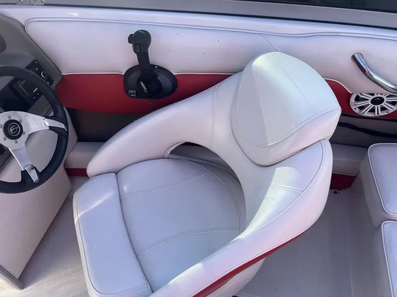 Slide: The Image of Interior of 2011 Crownline Boats 185 SS with white and red seating. - 10