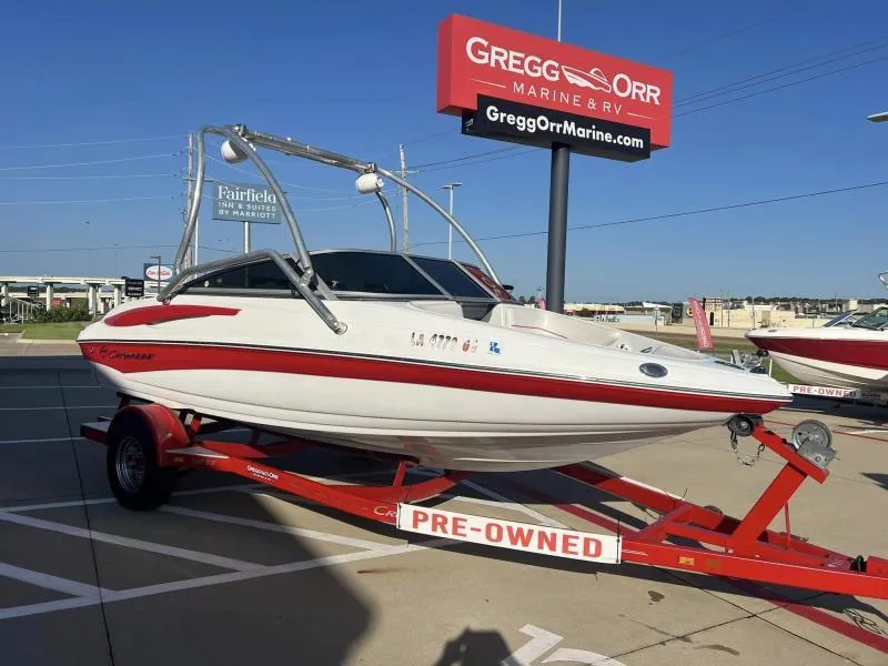 Slide: The Image of 2011 Crownline 185 SS boat on red trailer at Gregg Orr Marine dealership. - 6