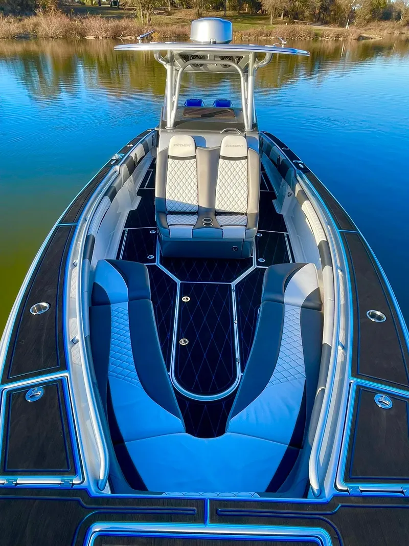 Slide: The Image of 2020 Statement 350 Open boat with luxurious seating on calm water. - 14