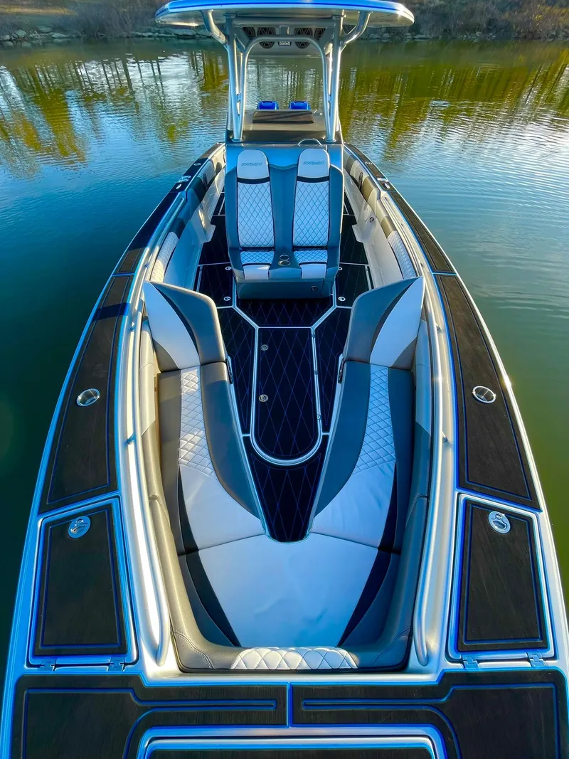 Slide: The Image of Luxury 2020 Statement 350 Open boat with sleek seating on calm water. - 17