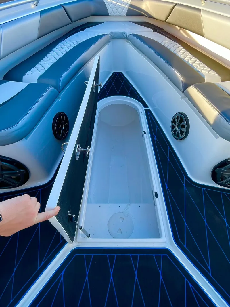 Slide: The Image of 2020 Statement 350 Open boat interior with open storage compartment and seating. - 19