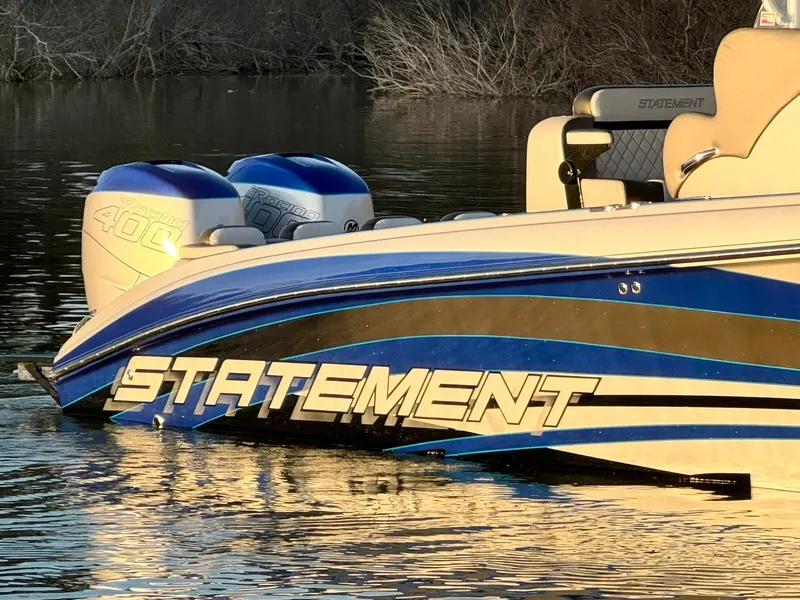 Slide: The Image of Statement 350 Open 2020 boat with twin engines on calm water. - 3