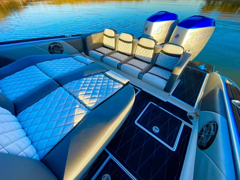 Slide: The Image of Luxurious 2020 Statement 350 Open boat interior with quilted seating and dual engines. - 35
