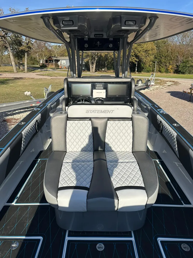 Slide: The Image of 2020 Statement 350 Open boat interior with luxury seating and modern dashboard. - 43