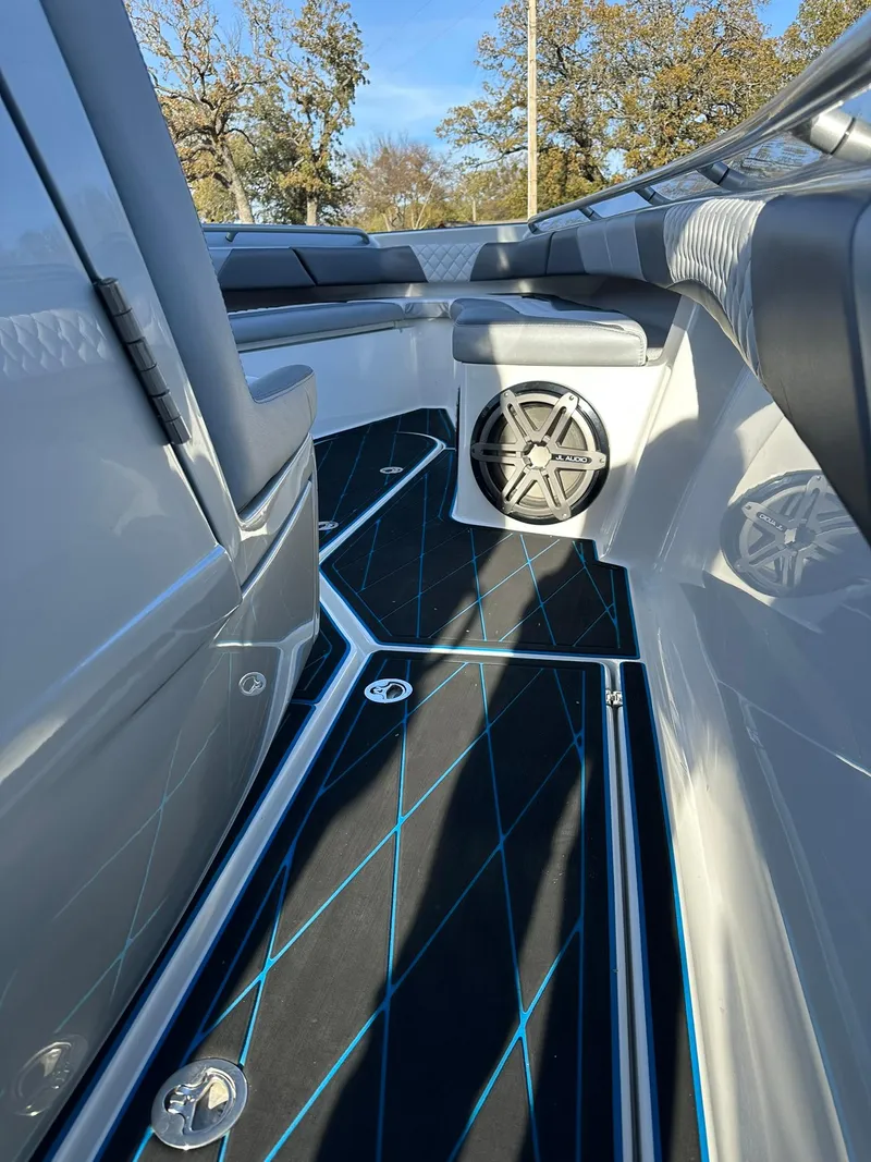 Slide: The Image of 2020 Statement 350 Open boat interior with sleek design and modern speaker system. - 47