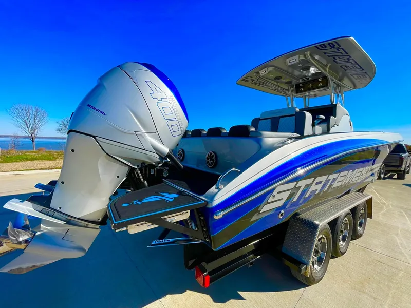 Slide: The Image of 2020 Statement 350 Open boat with powerful engine, sleek design, and vibrant blue accents. - 9