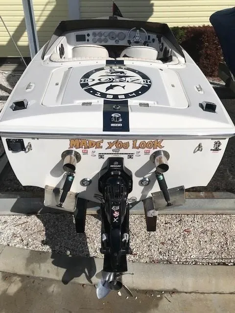 Slide: The Image of 2018 Donzi 22 Classic boat with custom graphics and dual exhaust. - 1