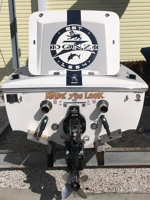 Slide: The Image of 2018 Donzi 22 Classic boat rear view with logo and "Made You Look" text. - 8