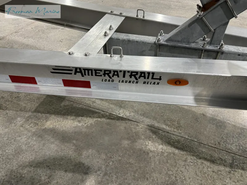 Slide: The Image of AmeraTrail boat trailer for 2022 Blackfin 332 CC, featuring durable construction and reflective markers. - 16