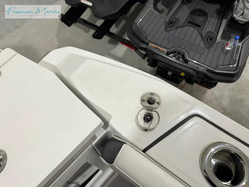 Slide: The Image of 2022 Blackfin 332 CC boat detail with sleek white finish and stainless steel fixtures. - 33