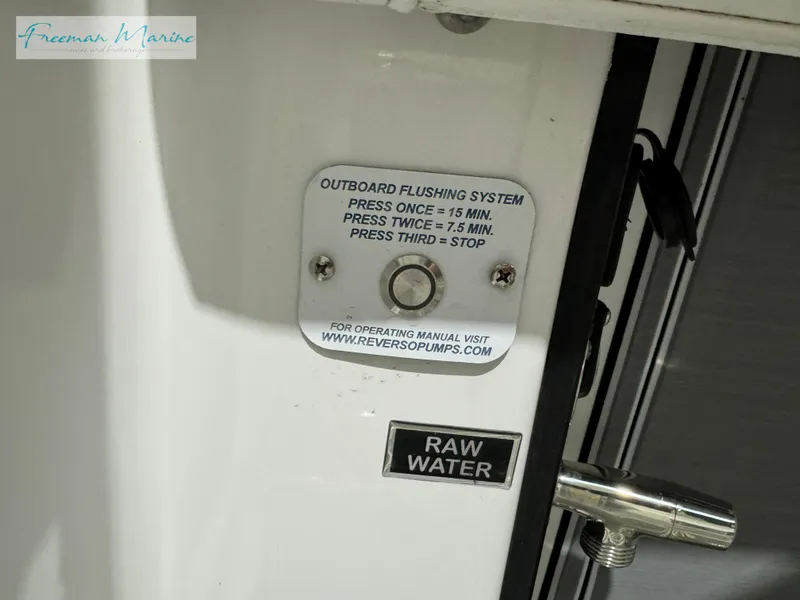 Slide: The Image of 2022 Blackfin 332 CC outboard flushing system with raw water access. - 43