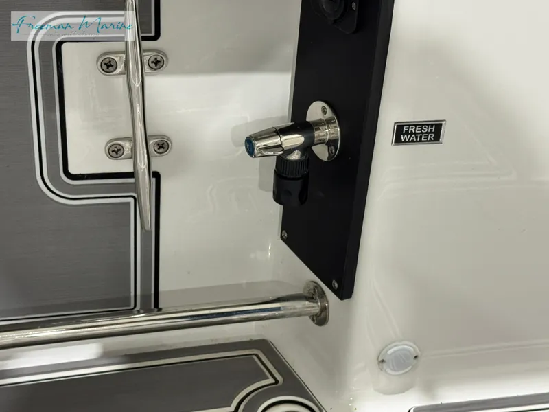 Slide: The Image of 2022 Blackfin 332 CC boat fresh water outlet detail. - 46