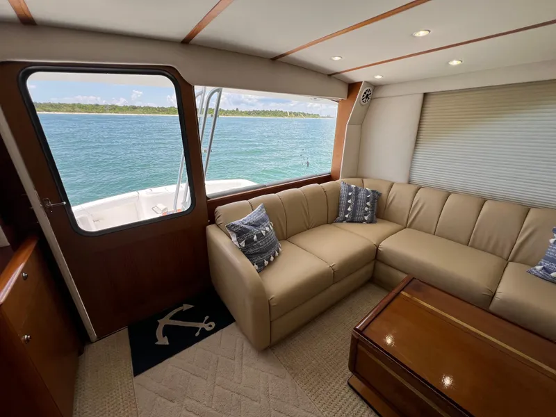 Slide: The Image of Luxurious interior of 2001 Ocean 52 Convertible yacht with ocean view. - 21