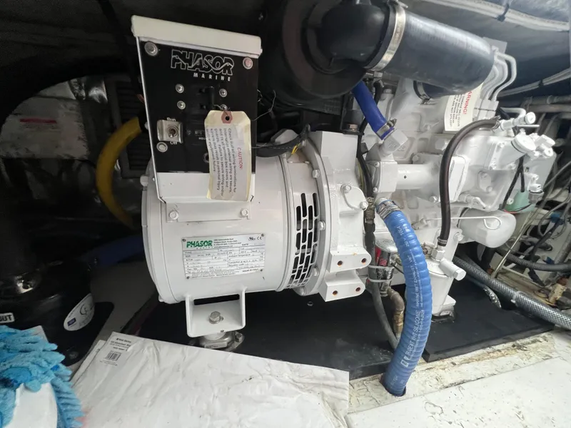 Slide: The Image of Phasor marine generator in 2001 Ocean 52 Convertible engine room. - 36