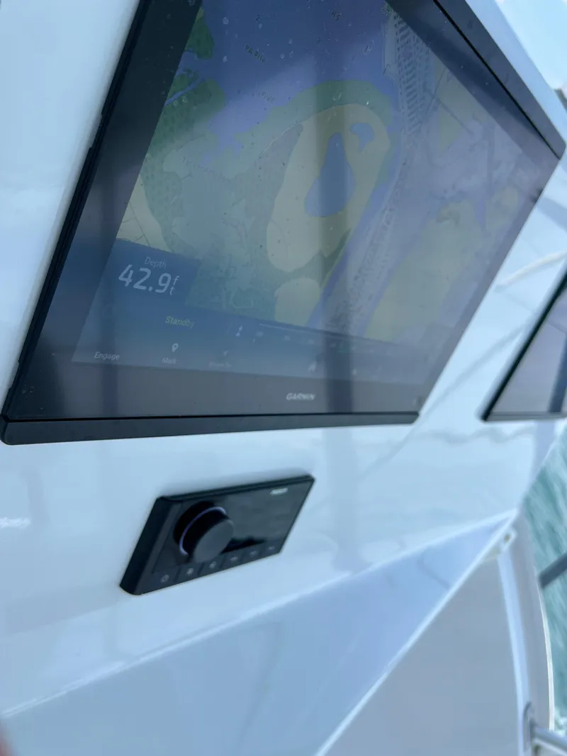Slide: The Image of Close-up of navigation screen on 2001 Ocean 52 Convertible yacht. - 45